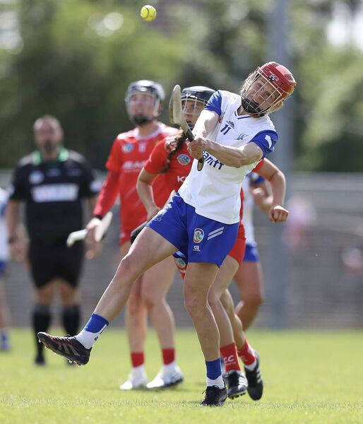 Waterford’s Beth Carton gets her shot away during the game against Cork.