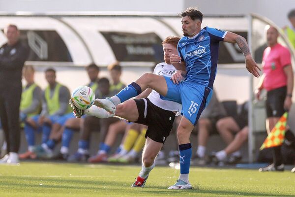 Waterford FC's Luke Heeney wins possession of the ball ahead of Dundalk's Aodh Dervin during their SSE Airtricity Men's Premier Division clash played at Oriel Park on Friday last. Photo: INPHO/Laszlo Geczo