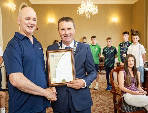 Mayor of Waterford City & County Cllr Liam Brazil presents a scroll to Neil Franks. Photo: Joe Evans Mayor of Waterford City & County Cllr Liam Brazil presents a scroll to Neil Franks. Photo: Joe Evans