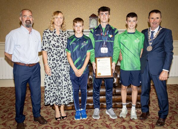 Mayor of Waterford City & County Cllr Liam Brazil presents a scroll to Ben Murphy and his family. Photo: Joe Evans Mayor of Waterford City & County Cllr Liam Brazil presents a scroll to Ben Murphy and his family. Photo: Joe Evans