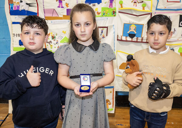 Sonnie-Tucker, Maggie and Ferdi Stokes accepted their sister Letisha's medals for Minor Award of the Pathway to Employment Programme, at Traveller Pride. Sonnie-Tucker, Maggie and Ferdi Stokes accepted their sister Letisha's medals for Minor Award of the Pathway to Employment Programme, at Traveller Pride.