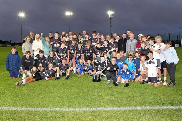 The Tramore team celebrate their U15A Woolfson Cup final win over Villa AFC played at Graun Park on Monday last. Photos: Noel Browne The Tramore team celebrate their U15A Woolfson Cup final win over Villa AFC played at Graun Park on Monday last. Photos: Noel Browne