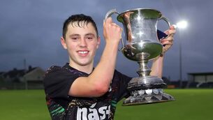 <p>Tramore captain Mocheál Ó Cuilleanáin with the Woolfson U15A Cup.</p> <p>Tramore captain Mocheál Ó Cuilleanáin with the Woolfson U15A Cup.</p>