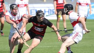 <p>De La Salle's Jake Dillon and Oisin Power trying to stop Ballygunner's Kevin Mahony from winning possession.</p>
