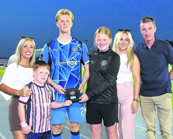 The Waterford FC In The Community Man of the Match was Jorgen Voilas and he is pictured receiving his award from James Harty Ballinroad FC and Ciamh Power, also included were Colin Power, Head of Community Development, Waterford FC ,Sandra Myler-Burke, Waterford FC secretary and Sophie Myler. Photo: Noel Browne