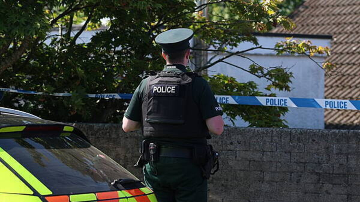 Police remain at the scene after three relatives found dead in family home