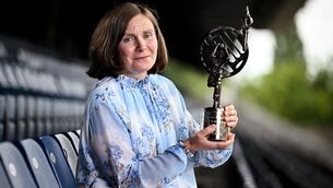 <p>GPA Lifetime Achievement Award recipient former Waterford ladies footballer Catriona Casey sits for a portrait with her award during the GPA Football Legends Lunch at Croke Park in Dublin. Photo: Seb Daly/Sportsfile</p>