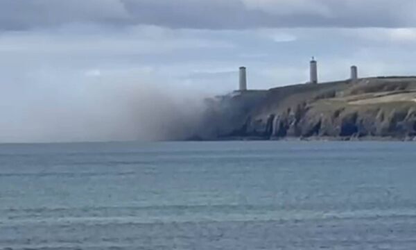 Fire services are tackling a blaze near the Metal Man in Tramore. Fire services are tackling a blaze near the Metal Man in Tramore.