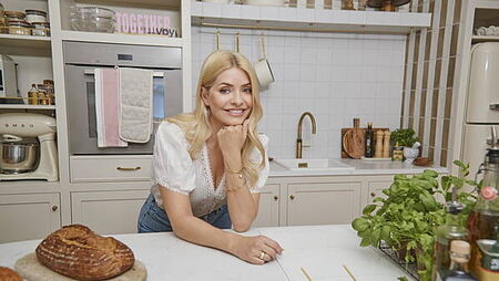 Holly Willoughby drinks wine and giggles over sexual innuendo in TV return
