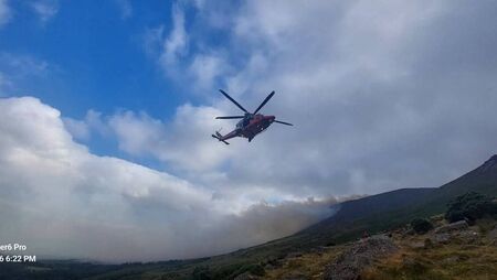 Injured walker is airlifted from Comeraghs amid continuing fires