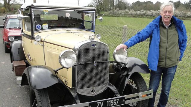 <p>John Flahavan with his1930 model A Cabriolet Convertible. Pic: Tom Hickey</p>