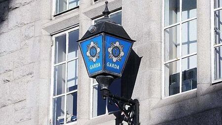 Gardaí talk man down from crane on Talbot Street