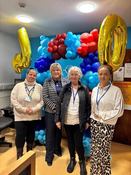 Minister Butler pictured alongside staff at St Brigid's Family &amp; Community Centre