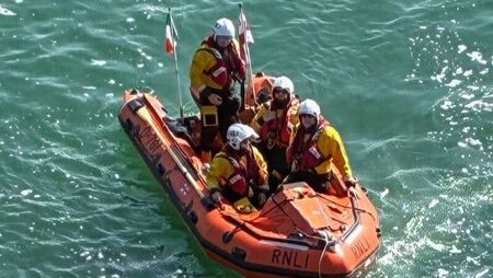 Waterford RLNI crew assist person in difficulty on cliffs