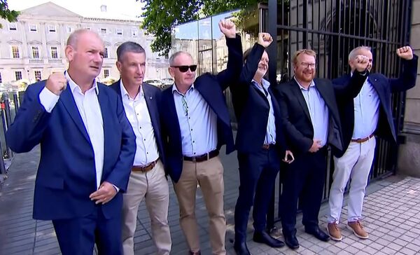 Jason Clancy, Colin Power, Paul Walsh, Gerry Mullane, Kevin Keating and Barry Murphy, survivors of Bill Kenneally, stood outside Dáil Éireann on the day of the State Apology Jason Clancy, Colin Power, Paul Walsh, Gerry Mullane, Kevin Keating and Barry Murphy, survivors of Bill Kenneally, stood outside Dáil Éireann on the day of the State Apology