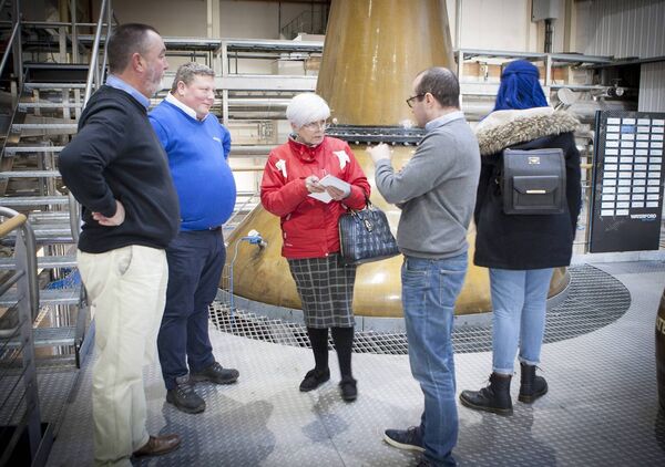 Waterford News &amp; Star reporter Marion O'Mara speaking with Paul McCusker, Distillery Manager, Ned Gahan, Head Distiller and Neill Conway, Head Brewer at Waterford Distillery. Photo: Joe Evans
