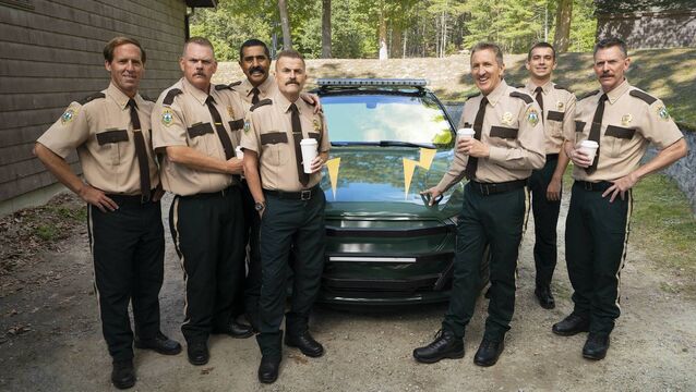 <p>Nat Faxon, Kevin Heffernan, Jay Chandrasekhar, Steve Lemme, Paul Soter, Andrew Dismukes, and Erik Stolhanske on the set of SUPER TROOPERS 3. Photo by Patrick Harbron, Courtesy of Searchlight Pictures. © 2025 Searchlight Pictures. All Rights Reserved.</p>