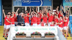 <p>Ballyduff Upper captain Jamie Hannon lifts the Co. Intermediate hurling championship trophy after receiving it from board chairman Neil Moore at Cappoquin Logistics Fraher Field. Photo: Noel Browne</p> <p>Ballyduff Upper captain Jamie Hannon lifts the Co. Intermediate hurling championship trophy after receiving it from board chairman Neil Moore at Cappoquin Logistics Fraher Field. Photo: Noel Browne</p>
