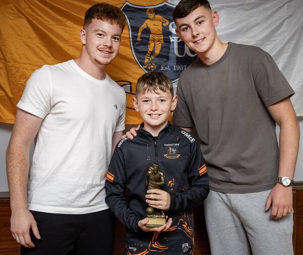 Oisin McEvoy, received his U-11A Southend Utd. Player of the Year award from Waterford FC players, Jason Healy and Sean Keane. Oisin McEvoy, received his U-11A Southend Utd. Player of the Year award from Waterford FC players, Jason Healy and Sean Keane.