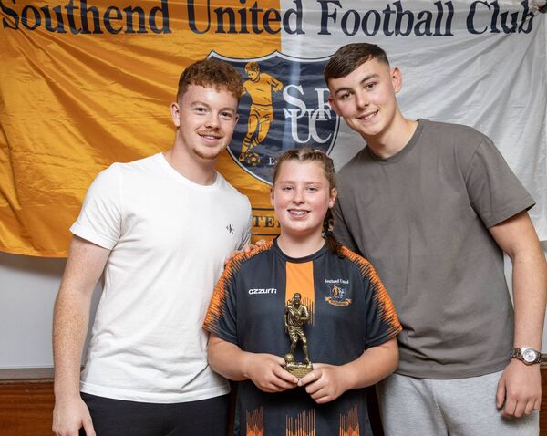 Lauren, received her U-12 Southend Utd. Player of the Year award from Waterford FC players, Jason Healy and Sean Keane. s Lauren, received her U-12 Southend Utd. Player of the Year award from Waterford FC players, Jason Healy and Sean Keane. s