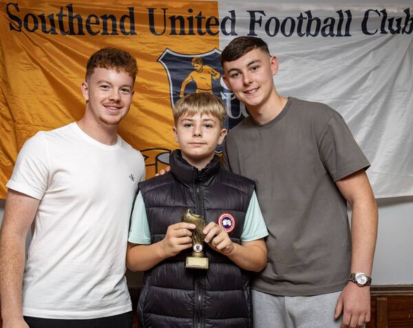 Tyler Daly, received his U-12D Southend Utd. Most Improved Player award from Waterford FC players, Jason Healy and Sean Keane. Tyler Daly, received his U-12D Southend Utd. Most Improved Player award from Waterford FC players, Jason Healy and Sean Keane.