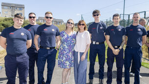 <p> Elaine and Mary with Members of the Watrerford City Fire Service, at the Sacred Heart Family Fun Day. Photo: Joe Evans</p>