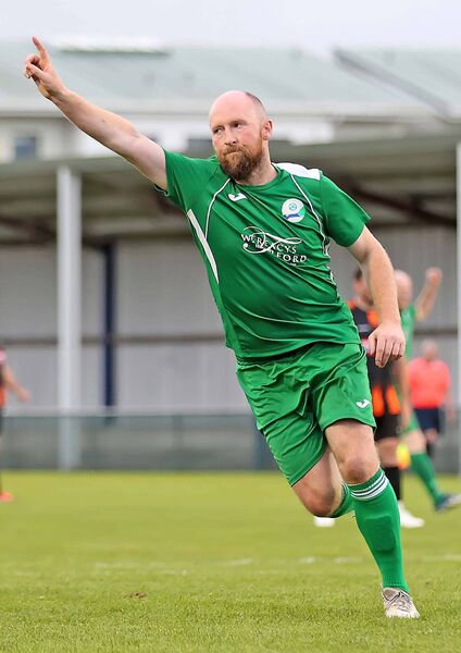 Ferrybank's Paul Phelan wheels away in delight after scoring the first goal of the final. Ferrybank's Paul Phelan wheels away in delight after scoring the first goal of the final.
