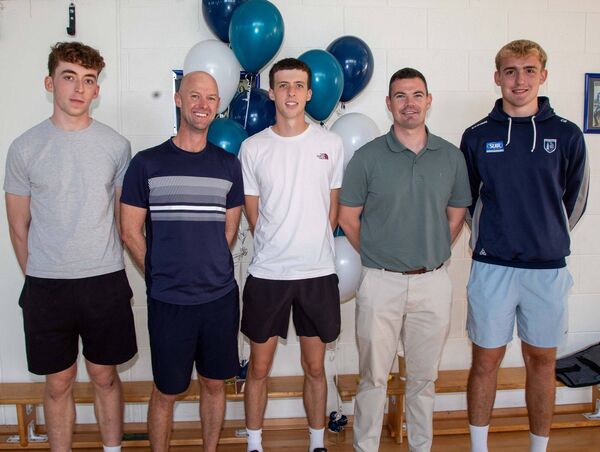 Attending were Alex Barry, Conor Parsons and Cillian Brennan with Mr. Hatton and Mr. Keane. Photo: John Power Attending were Alex Barry, Conor Parsons and Cillian Brennan with Mr. Hatton and Mr. Keane. Photo: John Power
