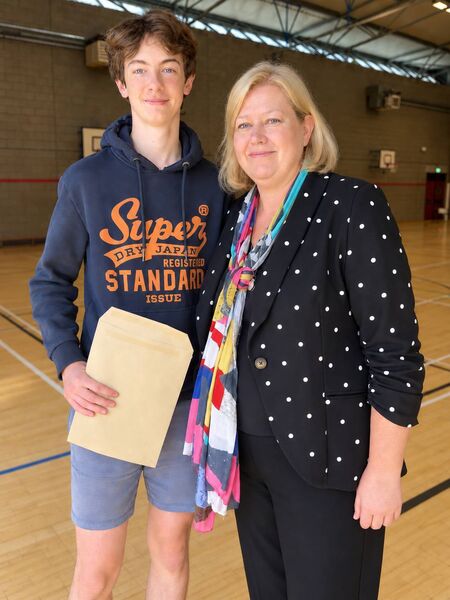 Fintan Molloy receives his excellent Junior cycle results from Abbey Community College Principal, Michelle Jefford. Fintan Molloy receives his excellent Junior cycle results from Abbey Community College Principal, Michelle Jefford.