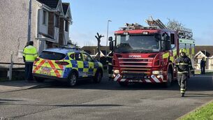 Garda units continue to arrive at scene of arson attack in Waterford, four confirmed dead Garda units continue to arrive at scene of arson attack in Waterford, four confirmed dead