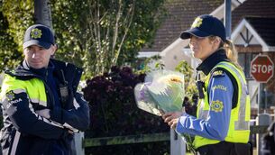 <p>Family and friends leave flowers with Gardai at Birchwood estate. Photo: Joe Evans</p> <p>Family and friends leave flowers with Gardai at Birchwood estate. Photo: Joe Evans</p>