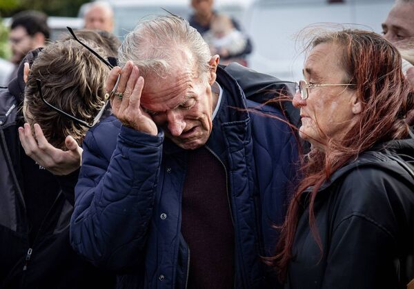 UNITED IN GRIEF: Paddy English, Philip's father pictured with Philip's former wife Anne in Birchwood. 