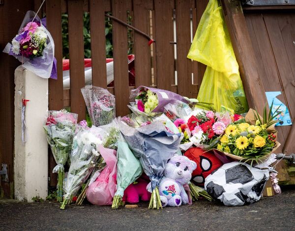 Flowers and tributes at the house in Birchwood Estate where Philip, Kim, Callum and Jayden English lost their lives. Photo: Joe Evans Flowers and tributes at the house in Birchwood Estate where Philip, Kim, Callum and Jayden English lost their lives. Photo: Joe Evans