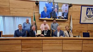 <p>James Veale is handed a plaque by Cathaoirleach of the Dungarvan/Lismore District, Cllr John Pratt</p> <p>James Veale is handed a plaque by Cathaoirleach of the Dungarvan/Lismore District, Cllr John Pratt</p>