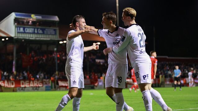 <p>Waterford's Pádraig Amond celebrates with teammates Tommy Lonergan after scoring against Shelbourne at Tolka Park. </p>